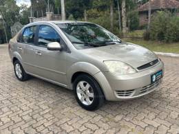 FORD - FIESTA - 2006/2007 - Dourada - R$ 25.900,00